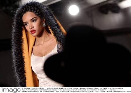 Lisbon, Portugal - A model presents a creation from the Angolan fashion designer Rose Palhares Fall Winter 2016 2017 collection during the Lisbon Fashion Week on March 11, 2016 in Lisbon, Portugal. This year Lisbon Fashion Week celebrates the 25th anniversary. Lisbon Portugal  - ZUMAn230