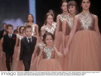 MOSCOW, RUSSIA. MARCH 12, 2016. Models showcase creations during a runway show for the Junona Fashion House s collection at the 2016 Mercedes Benz Fashion Week Russia at Manege Central Exhibition Hall. Artyom Geodakyan TASS  TS01930E