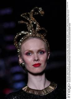 MOSCOW, RUSSIA. MARCH 12, 2016. A model showcases creations during a runway show for the Slava Zaitsev Fashion House s collection at the 2016 Mercedes Benz Fashion Week Russia at Manege Central Exhibition Hall. Artyom Geodakyan TASS  TS01932A
