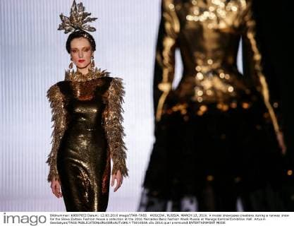 MOSCOW, RUSSIA. MARCH 12, 2016. A model showcases creations during a runway show for the Slava Zaitsev Fashion House s collection at the 2016 Mercedes Benz Fashion Week Russia at Manege Central Exhibition Hall. Artyom Geodakyan TASS  TS01933A