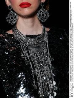 MOSCOW, RUSSIA. MARCH 12, 2016. A model showcases creations during a runway show for the Slava Zaitsev Fashion House s collection at the 2016 Mercedes Benz Fashion Week Russia at Manege Central Exhibition Hall. Artyom Geodakyan TASS  TS01933D