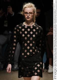 March 13, 2016 - Lisbon, Portugal - Model presents Autumn Winter 2016 creation by designer Filipe Faisca during the 45rd edition of Moda Lisboa Fashion Week at the Patio da Gale on Terreiro do Paco Square in Lisbon on March 13, 2016. NURPHOTO CARLOS PALMA. Lisbon Portugal  - ZUMAn230