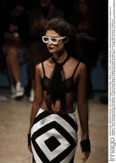 March 13, 2016 - Lisbon, Portugal - Model presents Autumn Winter 2016 creation by designer Filipe Faisca during the 45rd edition of Moda Lisboa Fashion Week at the Patio da Gale on Terreiro do Paco Square in Lisbon on March 13, 2016. NURPHOTO CARLOS PALMA. Lisbon Portugal  - ZUMAn230