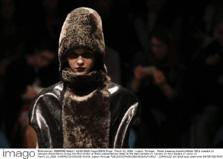 March 13, 2016 - Lisbon, Portugal - Model presents Autumn Winter 2016 creation by designer Filipe Faisca during the 45rd edition of Moda Lisboa Fashion Week at the Patio da Gale on Terreiro do Paco Square in Lisbon on March 13, 2016. NURPHOTO CARLOS PALMA. Lisbon Portugal  - ZUMAn230