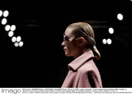 March 13, 2016 - Lisbon, Portugal - Model presents Autumn Winter 2016 creation by designer Luis Carvalho during the 45rd edition of Moda Lisboa Fashion Week at the Patio da Gale on Terreiro do Paco Square in Lisbon on March 13, 2016. NURPHOTO CARLOS PALMA. Lisbon Portugal  - ZUMAn230