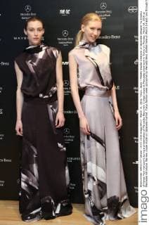 March 14, 2016, Tokyo, Japan - Models display creations of Japanese designer Yu Amatsu of Hanae Mori manuscrit during a presentation of Mercedes-Benz new C-class coupe at Mercedes showroom in Tokyo on Monday, March 14, 2016 as Mercedes introduces the new coupe model on Japanese market. Tokyo fashion week sponsored by Merceds Benz started here on March 14 and runs through to the 19th.  (lwxa000276)