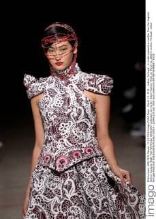 March 13, 2016 - Lisbon, Portugal - A model presents a creation from the Angolan fashion designer Nadir Tati Fall Winter 2016 2017 collection during the Lisbon Fashion Week on March 11, 2016 in Lisbon, Portugal. Lisbon Portugal  - ZUMAn230