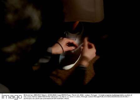 March 13, 2016 - Lisbon, Portugal - A model prepares backstage before a show of the Lisbon Fashion Week Fall Winter 2016 2017 on March 13, 2016 in Lisbon, Portugal. Lisbon Portugal  - ZUMAn230