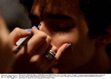 March 13, 2016 - Lisbon, Portugal - A model prepares backstage before a show of the Lisbon Fashion Week Fall Winter 2016 2017 on March 13, 2016 in Lisbon, Portugal. Lisbon Portugal  - ZUMAn230