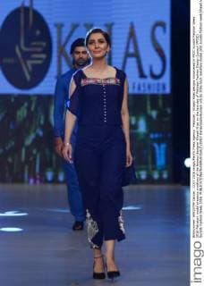 Pakistan : Khaadi Khas designs showcased in PFDC Sunsilk Fashion Week 2016 Pakistani model presents creations of the famous designer Khaadi Khas on the last day of Pakistan Fashion Design Council (PFDC) Sunsilk Fashion Week 2016.  RanaxSajidxHussain