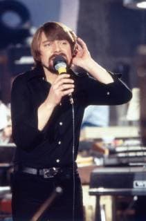 Jürgen von der Lippe Der deutsche Musiker und Komiker Jürgen von der Lippe mit seinem Programm Sing was Süßes , Deutschland 1970er Jahre. German musician and comedian Juergen von der Lippe with his stage programme Sing was Suesses , Germany 1970s. Copyright: Roba Schweigmann UnitedArchives21791