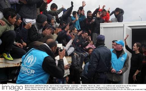 (160316) -- ATHENS, March 16, 2016 -- U.S. actress and special envoy of the United Nations High Commissioner for Refugees (UNHCR), Angelina Jolie (R), visits the temporary refugee facilities at the port of Piraeus, near Athens, Greece, March 16, 2016. ) GREECE-ATHENS-REFUGEES-ANGELINA JOLIE MariosxLolos 