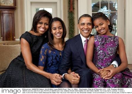 Dec. 11, 2011 - Washington, District of Columbia, U.S. - U.S. President BARACK OBAMA and his wife First Lady MICHELLE OBAMA with their children MALIA ANN OBAMA and NATASHA OBAMA. For a new family portrait, I chose a sofa in the Oval Office mostly because the State Floor was busy with tours for the Christmas holiday. Since portraiture is not my strong suit, I tried to make the setup as simple as possible said Pete Souza, White House photographer. - ZUMAz03_