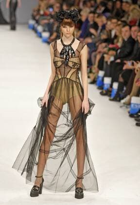 March 21, 2016 - Kiev, Ukraine - A model presents a creation by Ukrainian designer AINA GASSE,during the Ukrainian Fashion Week in Kiev, Ukraine,on 21 March,2016. The event presents Autumn Winter 2016-2017 collections by Ukrainian and international designers from 17 to 23 March. Kiev Ukraine - ZUMAg194