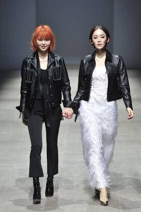 BEIJING, CHINA - MARCH 24: (CHINA OUT) Fashion designer Zhao Tao (L), actress and model Gulnazar showcase on runway during the 2016 Alexander.T.Zhao Collection Autumn Winter on March 24, 2016 in Beijing, China.  CFP481674654