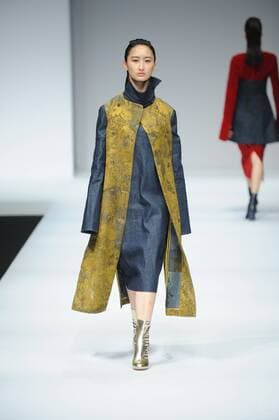 BEIJING, CHINA - MARCH 25: (CHINA OUT) A model showcases designs on the runway at ZHAO QIANYAN Collection during the Mercedes-Benz China Fashion Week Autumn Winter 2016 17 at 751D.Park on March 25, 2016 in Beijing, China.  CFP481722715