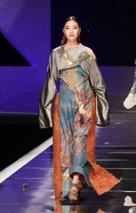 BEIJING, CHINA - MARCH 25: (CHINA OUT) A model showcases designs on the runway at Hempel Award - the 24th China International Young Fashion Designers Contest during day one of the Mercedes-Benz China Fashion Week A W 16 17 Collection at Beijing Hotel on March 25, 2016 in Beijing, China.  CFP481722772