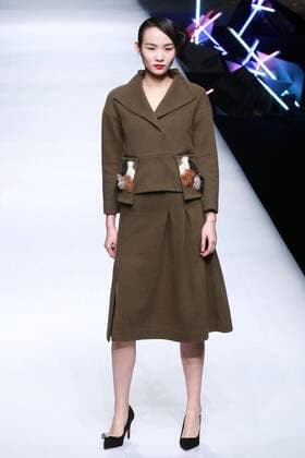BEIJING, CHINA - MARCH 26: (CHINA OUT) A model showcases designs on the runway at POLY BRIGHT Collection during the Mercedes-Benz China Fashion Week Autumn Winter 2016 2017 at Beijing Hotel on March 26, 2016 in Beijing, China.  CFP481740031
