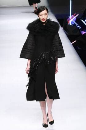 BEIJING, CHINA - MARCH 26: (CHINA OUT) A model showcases designs on the runway at POLY BRIGHT Collection during the Mercedes-Benz China Fashion Week Autumn Winter 2016 2017 at Beijing Hotel on March 26, 2016 in Beijing, China.  CFP481740035