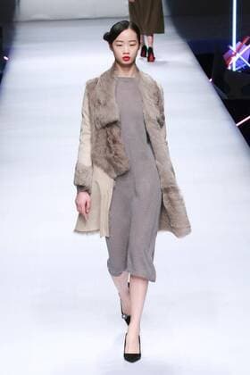 BEIJING, CHINA - MARCH 26: (CHINA OUT) A model showcases designs on the runway at POLY BRIGHT Collection during the Mercedes-Benz China Fashion Week Autumn Winter 2016 2017 at Beijing Hotel on March 26, 2016 in Beijing, China.  CFP481740039