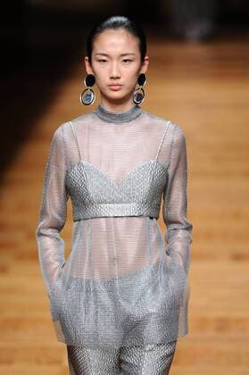 BEIJING, CHINA - MARCH 26: (CHINA OUT) A model showcases designs on the runway at Asahi Kasei Chinese Fashion Designer Creativity Award - Liu Sicong Collection during the Mercedes-Benz China Fashion Week Autumn Winter 2016 2017 at Beijing Hotel on March 26, 2016 in Beijing, China.  CFP481757747