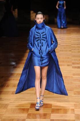 BEIJING, CHINA - MARCH 26: (CHINA OUT) A model showcases designs on the runway at Asahi Kasei Chinese Fashion Designer Creativity Award - Liu Sicong Collection during the Mercedes-Benz China Fashion Week Autumn Winter 2016 2017 at Beijing Hotel on March 26, 2016 in Beijing, China.  CFP481757753