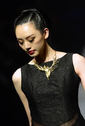 BEIJING, CHINA - MARCH 26: (CHINA OUT) A model showcases designs on the runway at HMR Collection during the Mercedes-Benz China Fashion Week Autumn Winter 2016 2017 at 751D.Park on March 26, 2016 in Beijing, China.  CFP481765107