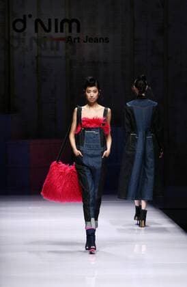 BEIJING, CHINA - MARCH 27: (CHINA OUT) A model showcases designs on the runway at d nim Collection during the Mercedes-Benz China Fashion Week Autumn Winter 2016 2017 at Beijing Hotel on March 27, 2016 in Beijing, China.  CFP481773994