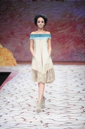 BEIJING, CHINA - MARCH 27: (CHINA OUT) A model showcases designs on the runway at Tao LouLan Collection during the Mercedes-Benz China Fashion Week Autumn Winter 2016 2017 at 751D.Park on March 27, 2016 in Beijing, China.  CFP481794472