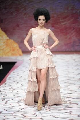 BEIJING, CHINA - MARCH 27: (CHINA OUT) A model showcases designs on the runway at Tao LouLan Collection during the Mercedes-Benz China Fashion Week Autumn Winter 2016 2017 at 751D.Park on March 27, 2016 in Beijing, China.  CFP481794492