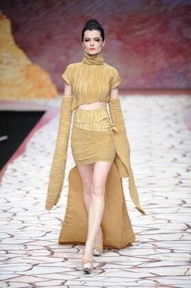 BEIJING, CHINA - MARCH 27: (CHINA OUT) A model showcases designs on the runway at Tao LouLan Collection during the Mercedes-Benz China Fashion Week Autumn Winter 2016 2017 at 751D.Park on March 27, 2016 in Beijing, China.  CFP481794496