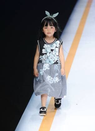 BEIJING, CHINA - MARCH 27: (CHINA OUT) A model showcases designs on the runway at COMME TU ES Collection during the Mercedes-Benz China Fashion Week Autumn Winter 2016 2017 at Beijing Hotel on March 27, 2016 in Beijing, China.  CFP481794505