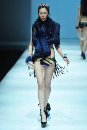 BEIJING, CHINA - MARCH 28: (CHINA OUT) A model showcases designs on the runway at XEFIEE Collection during the Mercedes-Benz China Fashion Week Autumn Winter 2016 2017 at 751D.Park on March 28, 2016 in Beijing, China.  CFP481829606