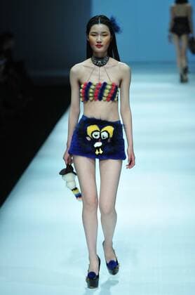 BEIJING, CHINA - MARCH 28: (CHINA OUT) A model showcases designs on the runway at XEFIEE Collection during the Mercedes-Benz China Fashion Week Autumn Winter 2016 2017 at 751D.Park on March 28, 2016 in Beijing, China.  CFP481829603