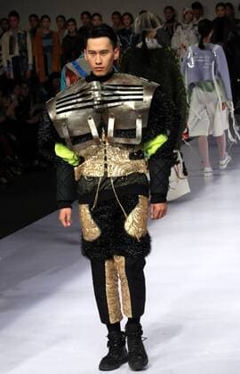 (160329) -- BEIJING, March 29, 2016 -- A model presents fashion creations during a show titled Beijing Institute of Fashion Technology¡¤Emerging Design Collection at China Fashion Week in Beijing, capital of China, March 29, 2016. The theme of the fashion show is Micro to Wave . ) (mcg) CHINA-BEIJING-FASHION WEEK- MICRO TO WAVE (CN) LixMingfang 