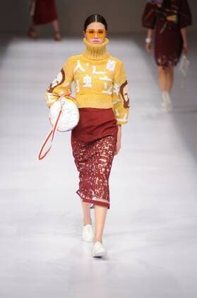 BEIJING, CHINA - MARCH 29: (CHINA OUT) A model showcases designs on the runway at Beijing Institute of Fashion Technology¡¤Emerging Design Collection & BIFT¡¤ELLASSAY Scholarship Awarding Ceremony during the Mercedes-Benz China Fashion Week Autumn Winter 2016 2017 at Beijing Hotel on March 29, 2016 in Beijing, China.  CFP481872751