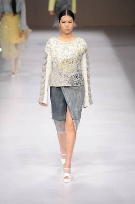BEIJING, CHINA - MARCH 29: (CHINA OUT) A model showcases designs on the runway at Beijing Institute of Fashion Technology¡¤Emerging Design Collection & BIFT¡¤ELLASSAY Scholarship Awarding Ceremony during the Mercedes-Benz China Fashion Week Autumn Winter 2016 2017 at Beijing Hotel on March 29, 2016 in Beijing, China.  CFP481872761