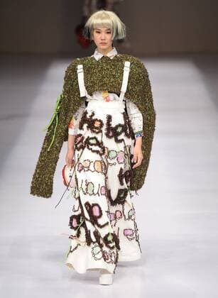 BEIJING, CHINA - MARCH 29: (CHINA OUT) A model showcases designs on the runway at Beijing Institute of Fashion Technology¡¤Emerging Design Collection & BIFT¡¤ELLASSAY Scholarship Awarding Ceremony during the Mercedes-Benz China Fashion Week Autumn Winter 2016 2017 at Beijing Hotel on March 29, 2016 in Beijing, China.  CFP481872787
