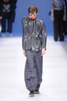 BEIJING, CHINA - MARCH 29: (CHINA OUT) A model showcases designs on the runway at Beijing Institute of Fashion Technology¡¤Emerging Design Collection & BIFT¡¤ELLASSAY Scholarship Awarding Ceremony during the Mercedes-Benz China Fashion Week Autumn Winter 2016 2017 at Beijing Hotel on March 29, 2016 in Beijing, China.  CFP481872796