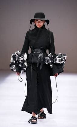 BEIJING, CHINA - MARCH 29: (CHINA OUT) A model showcases designs on the runway at Beijing Institute of Fashion Technology¡¤Emerging Design Collection & BIFT¡¤ELLASSAY Scholarship Awarding Ceremony during the Mercedes-Benz China Fashion Week Autumn Winter 2016 2017 at Beijing Hotel on March 29, 2016 in Beijing, China.  CFP481872867