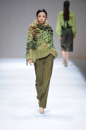BEIJING, CHINA - MARCH 29: (CHINA OUT) A model showcases designs on the runway at Fei Gallery & Boutique Collection during the Mercedes-Benz China Fashion Week Autumn Winter 2016 2017 at Beijing Hotel on March 29, 2016 in Beijing, China.  CFP481873139