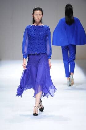 BEIJING, CHINA - MARCH 29: (CHINA OUT) A model showcases designs on the runway at Fei Gallery & Boutique Collection during the Mercedes-Benz China Fashion Week Autumn Winter 2016 2017 at Beijing Hotel on March 29, 2016 in Beijing, China.  CFP481873140