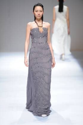 BEIJING, CHINA - MARCH 29: (CHINA OUT) A model showcases designs on the runway at Fei Gallery & Boutique Collection during the Mercedes-Benz China Fashion Week Autumn Winter 2016 2017 at Beijing Hotel on March 29, 2016 in Beijing, China.  CFP481873142