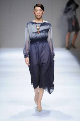 BEIJING, CHINA - MARCH 29: (CHINA OUT) A model showcases designs on the runway at Fei Gallery & Boutique Collection during the Mercedes-Benz China Fashion Week Autumn Winter 2016 2017 at Beijing Hotel on March 29, 2016 in Beijing, China.  CFP481873145