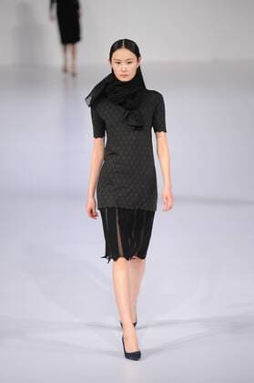 BEIJING, CHINA - MARCH 29: (CHINA OUT) A model showcases designs on the runway at DUXI Collection during the Mercedes-Benz China Fashion Week Autumn Winter 2016 2017 at Beijing Hotel on March 29, 2016 in Beijing, China.  CFP481873085