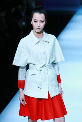 BEIJING, CHINA - MARCH 29: (CHINA OUT) A model showcases designs on the runway at Ling Wu Fine Cashmere Fashion Brands Joint Collection during the Mercedes-Benz China Fashion Week Autumn Winter 2016 2017 at 751D¡¤PARK on March 29, 2016 in Beijing, China.  CFP481886696