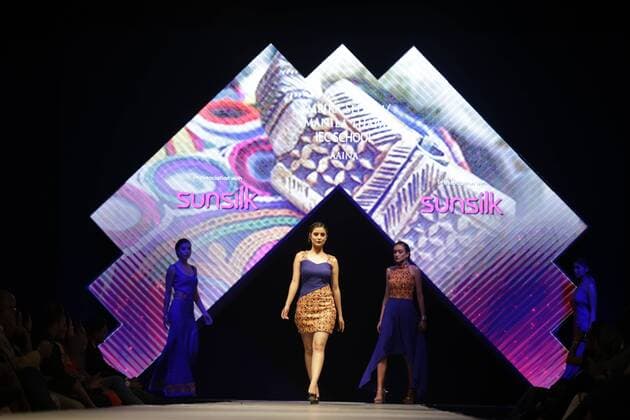 March 30, 2016 - Kathmandu, Nepal - Nepalese models catwalk on the runway during the Nepal fashion week also known as The Himalayan Times TGIF Nepal Fashion Week at Hyatt Regency in Kathmandu, Nepal on Wednesday, March 30, 2016. Celebrities and fashion models from around the world come to represent for the designers to promote their designs. The event is the top most fashion week of the country held annually by The Himalayan Times, a leading and largest selling English daily newspaper in Nepal. The fashion week lasts for 4 days with glitz and glamor on the catwalk. Kathmandu Nepal - ZUMAg200