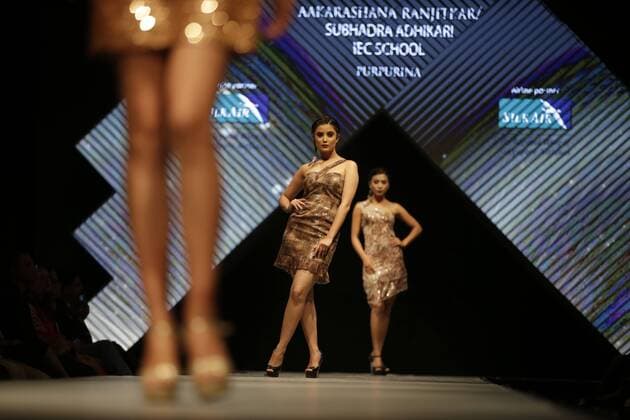 March 30, 2016 - Kathmandu, Nepal - Nepalese models catwalk on the runway during the Nepal fashion week also known as The Himalayan Times TGIF Nepal Fashion Week at Hyatt Regency in Kathmandu, Nepal on Wednesday, March 30, 2016. Celebrities and fashion models from around the world come to represent for the designers to promote their designs. The event is the top most fashion week of the country held annually by The Himalayan Times, a leading and largest selling English daily newspaper in Nepal. The fashion week lasts for 4 days with glitz and glamor on the catwalk. Kathmandu Nepal - ZUMAg200