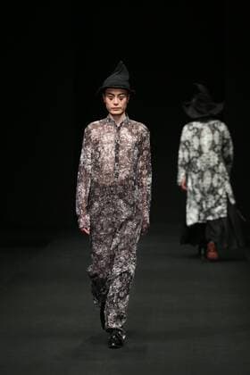BEIJING, CHINA - MARCH 30: (CHINA OUT) A model showcases designs on the runway at XINSHEN LINEN & Sun Lin Collection during the Mercedes-Benz China Fashion Week Autumn Winter 2016 2017 at 751D.Park on March 30, 2016 in Beijing, China.  CFP481928433