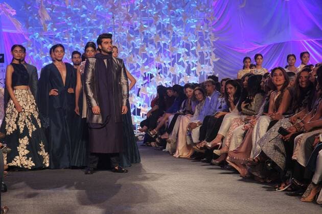MUMBAI, INDIA - MARCH 29: Bollywood actors Arjun Kapoor and Kareena Kapoor Khan during the opening show of Lakme Fashion Week Summer Resort 2016, at Mehboob Studio, Bandra on March 29, 2016 in Mumbai, India. (Photo by Pramod Thakur Hindustan Times ) Lakme Fashion Week Summer Resort 2016